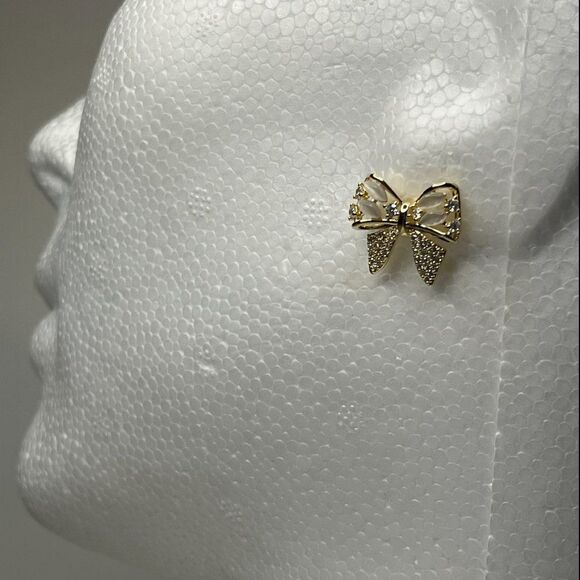 New  bow shape, feminine earrings in gold with clear stones, dainty, sparkling - Picture 4 of 16